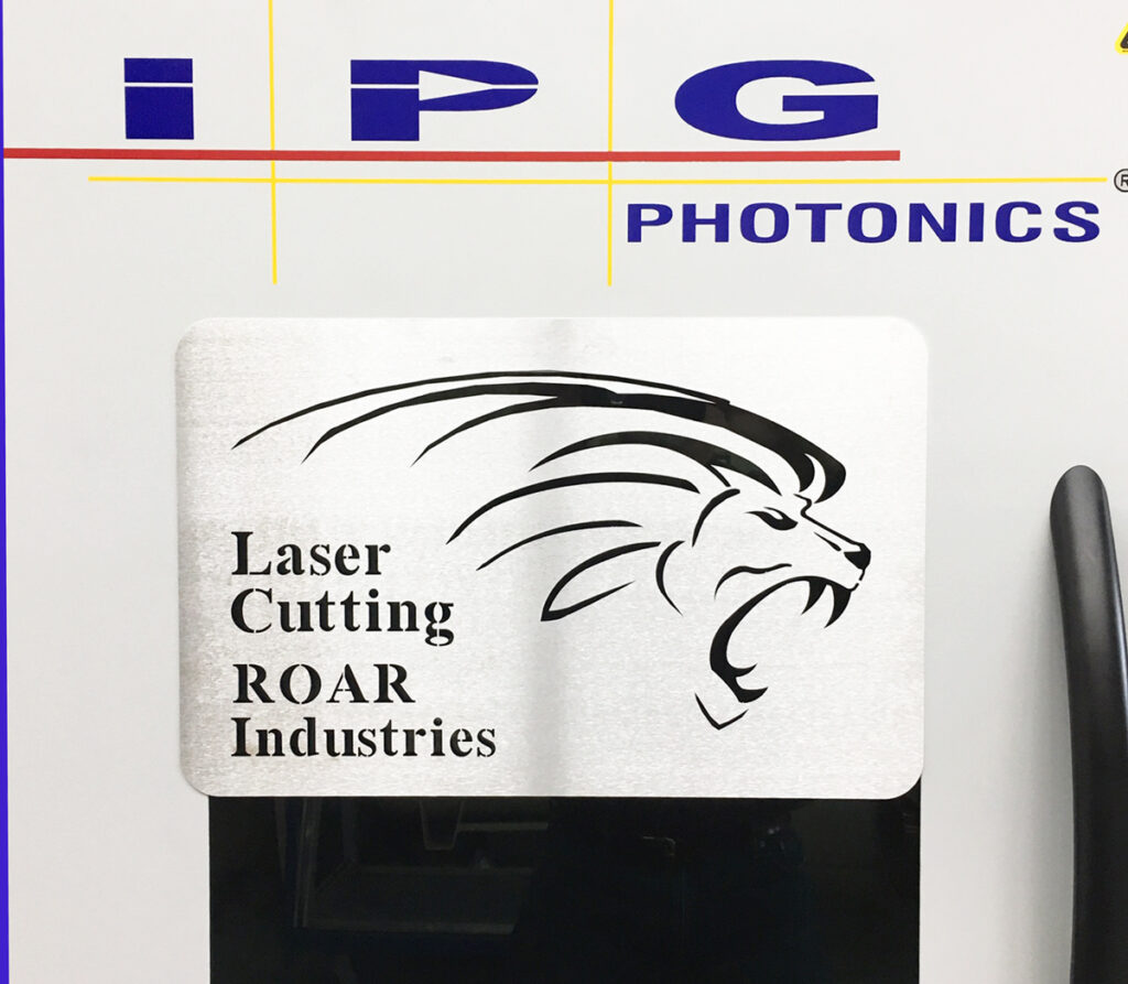 laser cut Roar Industries logo
