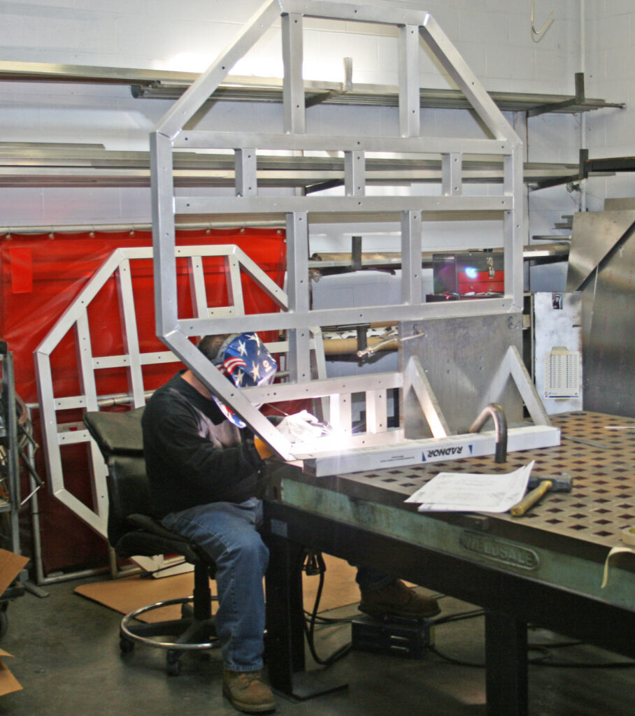 Man working at a frame
